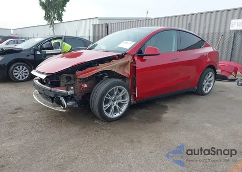2023 Tesla Model Y Awd/Long Range Dual Motor All-Wheel Drive z USA, uszkodzony, nr VIN 7SAYGDEE9PA115198
